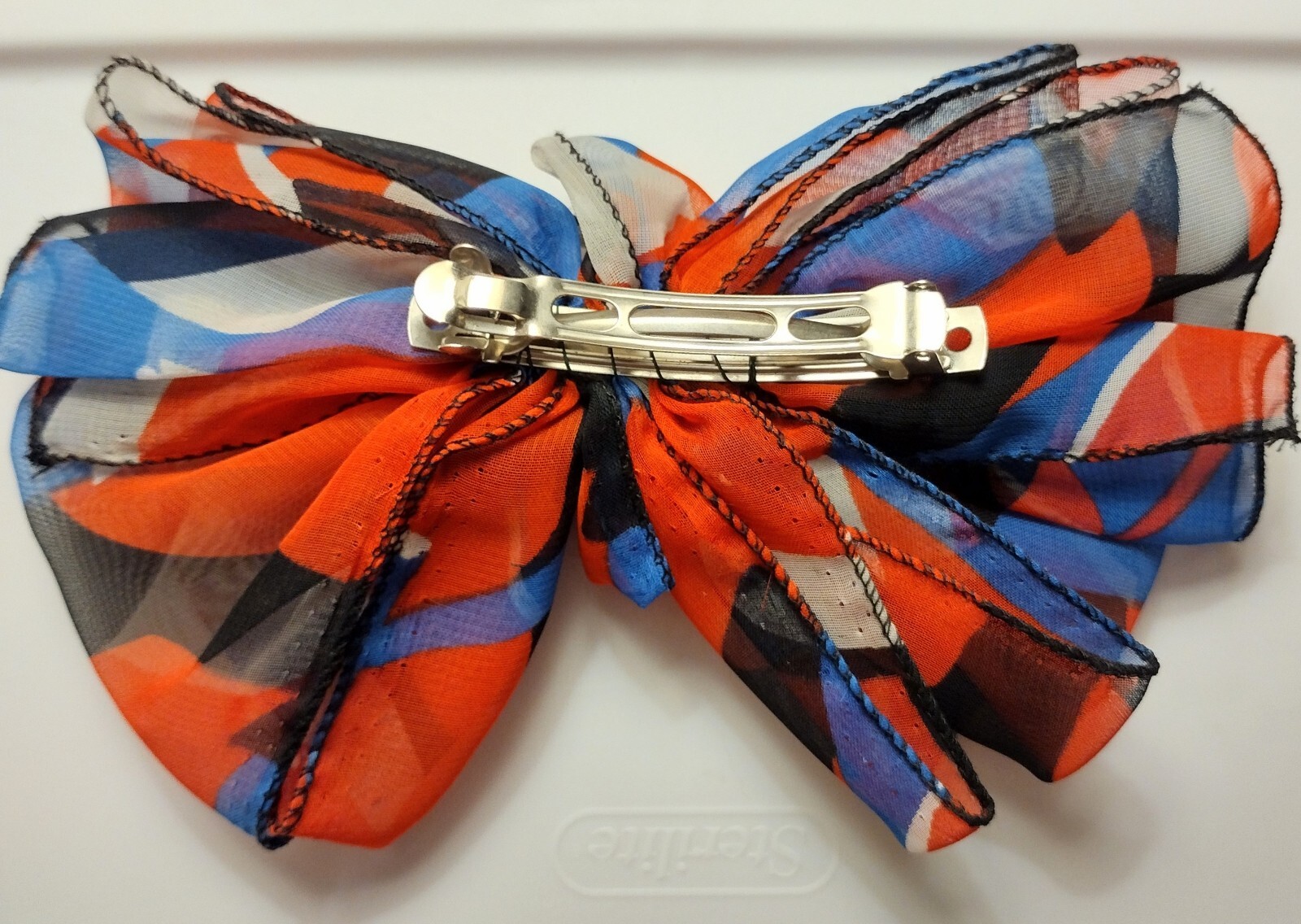 Large Hair Barrette with Flowy Fabric Bow. Dark Blue, light blue, white, and red