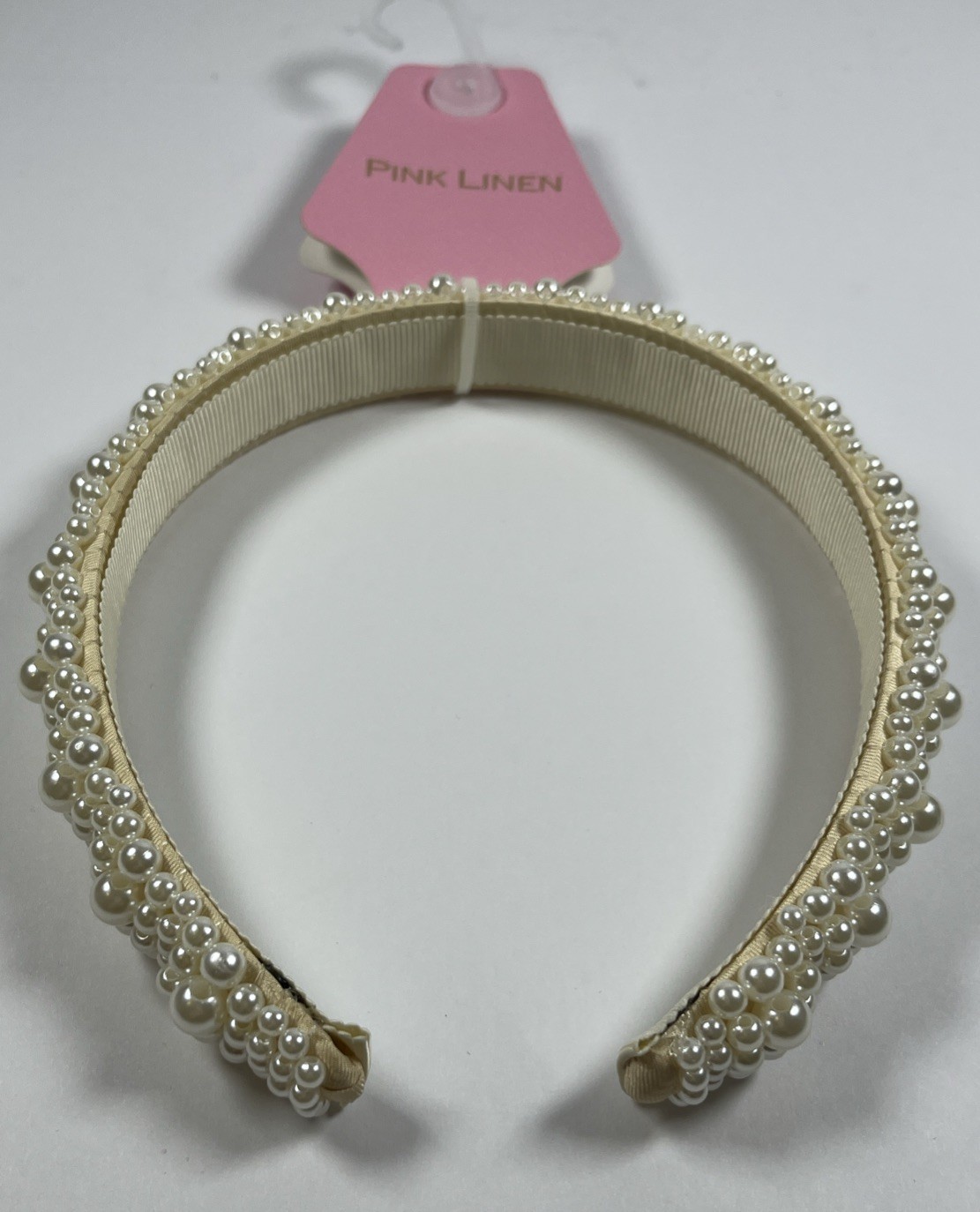 Pearl Headband featuring a wide design adorned with various sizes