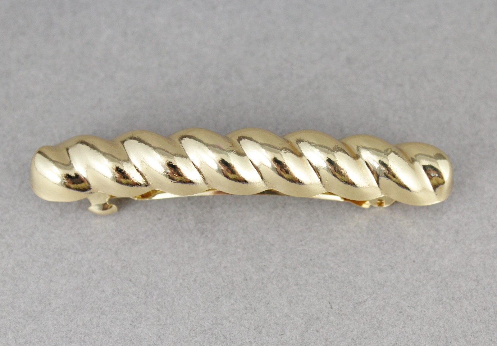Gold metal barrette curved hair clip leaves 3″ long twist swirl pattern