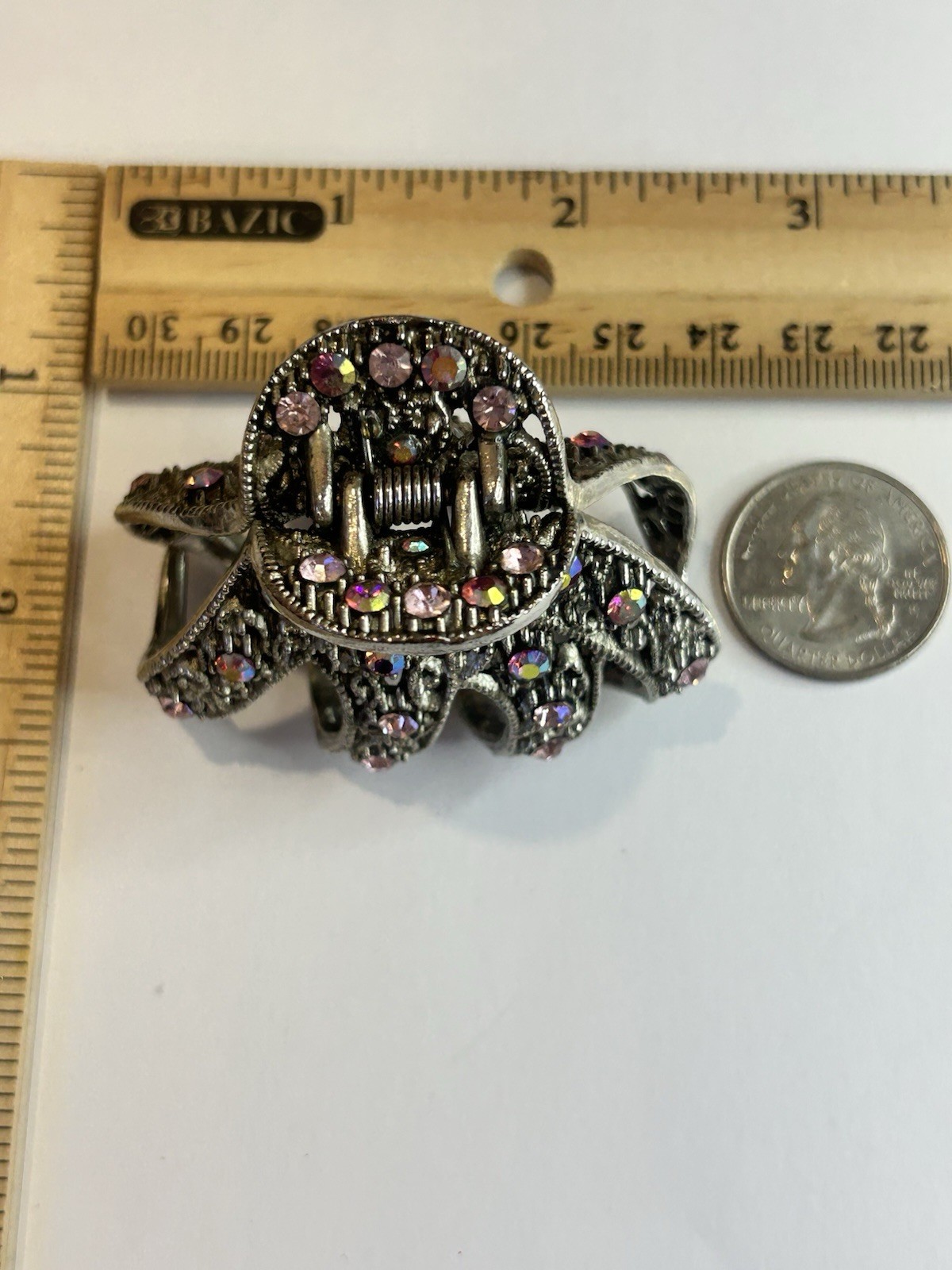 Bella Fashion Jewelry metal claw clip features intricate filigree work and spark