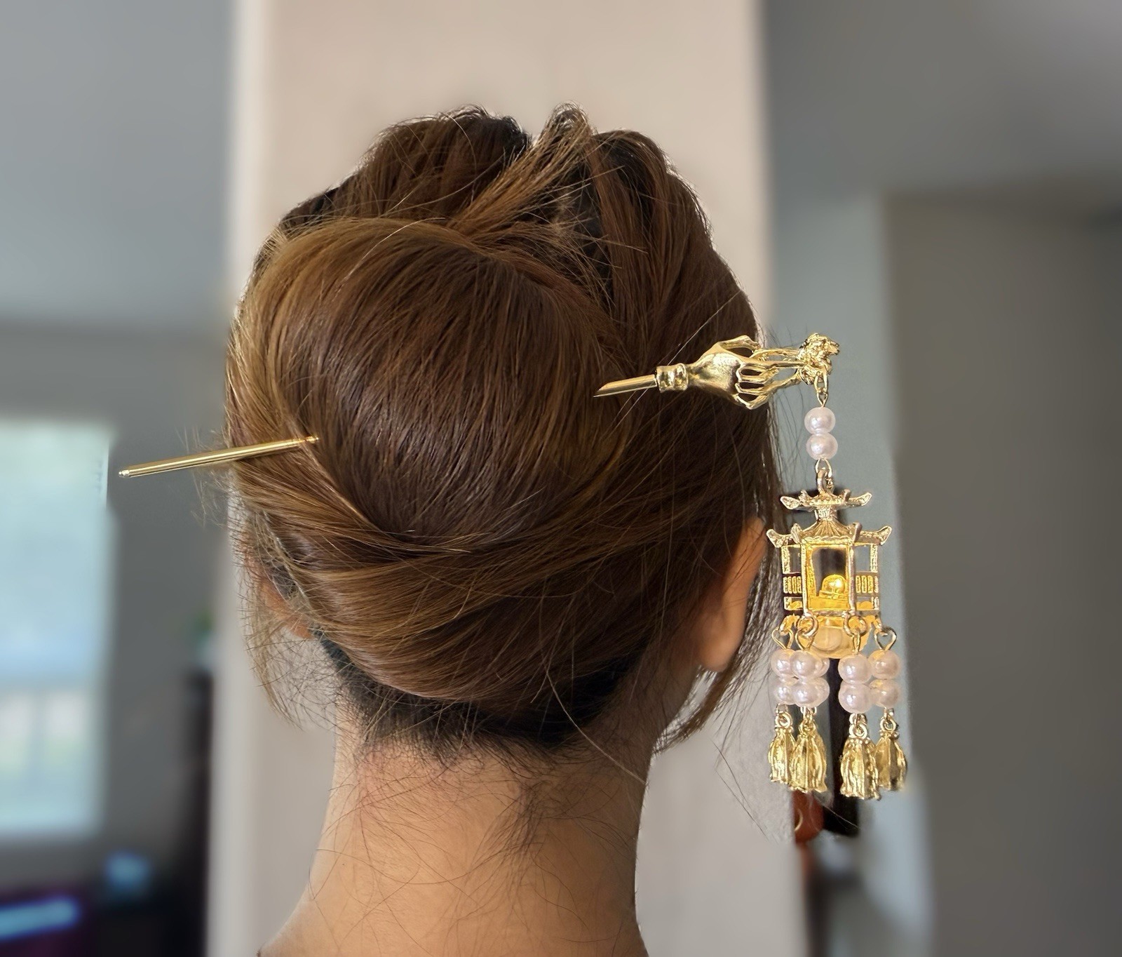 Luminous Gold Tone Hair Pin with Dangling Pagoda Charm & White Beaded Accents