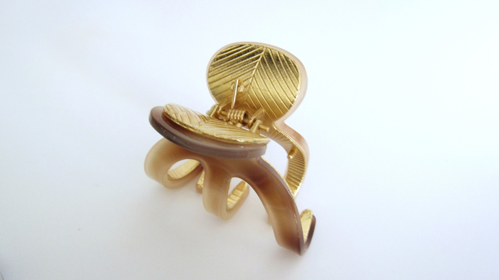 Medium brown beige gold tone textured acrylic and metal hair claw clip
