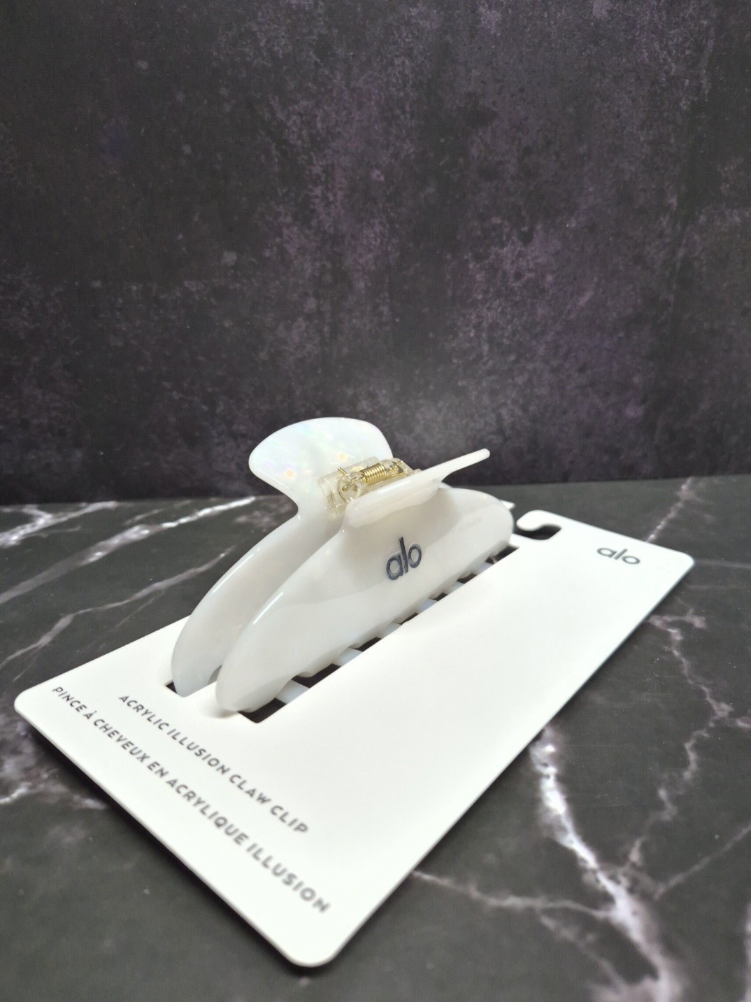 Alo Yoga white acrylic illusion hair clip