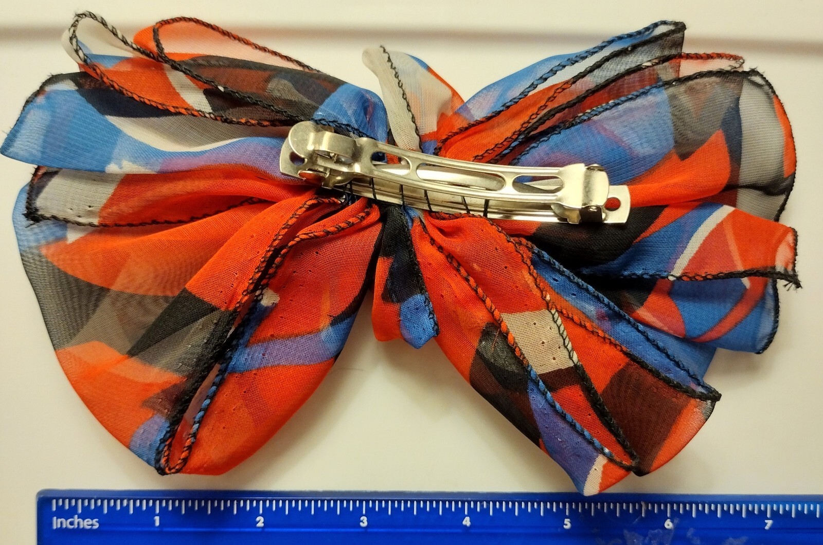 Large Hair Barrette with Flowy Fabric Bow. Dark Blue, light blue, white, and red