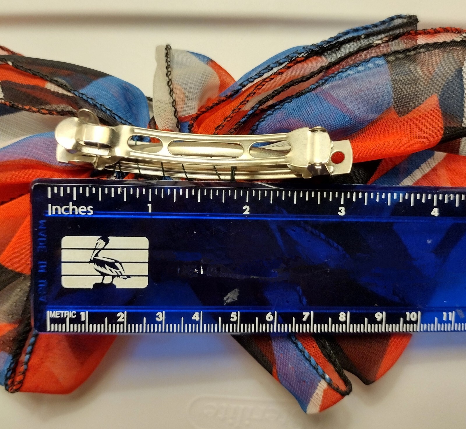 Large Hair Barrette with Flowy Fabric Bow. Dark Blue, light blue, white, and red