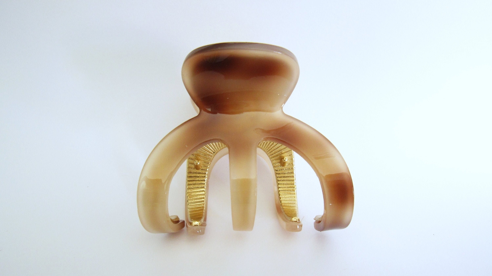 Medium brown beige gold tone textured acrylic and metal hair claw clip