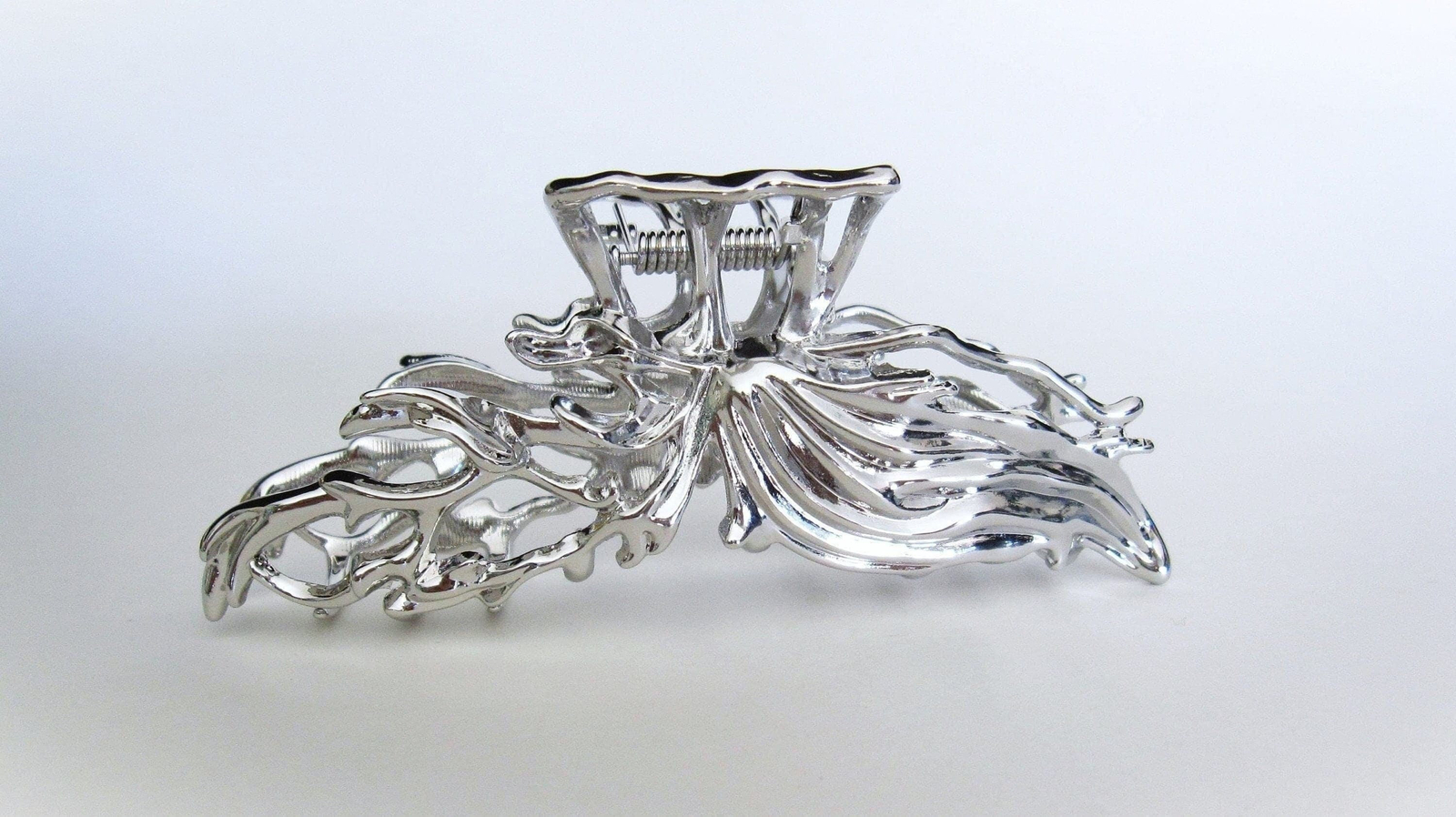 Large silver metal wavy hair claw clip for medium thick hair